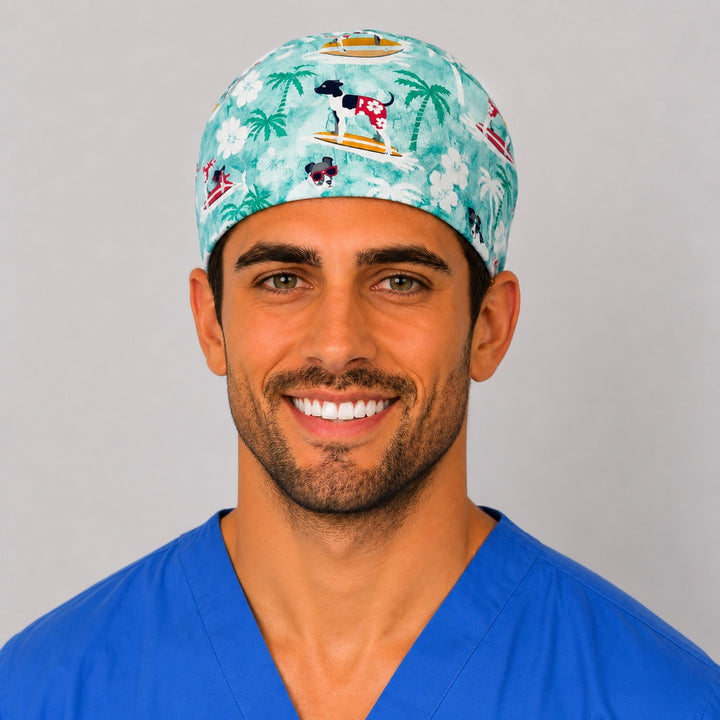 Dog surfing scrub cap front view — tropical beach print with pups riding surfboards, cotton tie-back surgical cap for vet techs and dog lovers