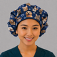Personalized photo scrub cap — custom photo bouffant surgical hat for women, navy with paw prints & hearts, side view with room for long hair, handmade USA.