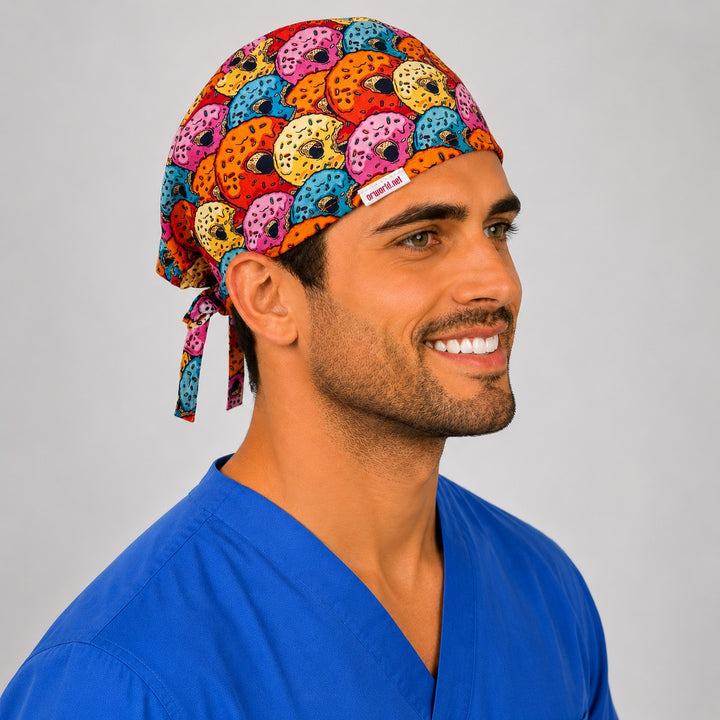 Side profile of the colorful donut print tie-back scrub cap showing the sprinkle donut print and tie closure