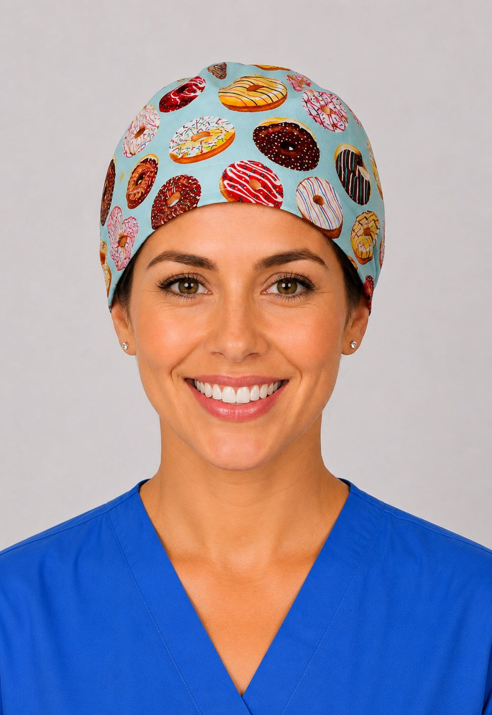 Side profile of doughnut scrub cap for women with short hair, mint foodie nurse OR cap