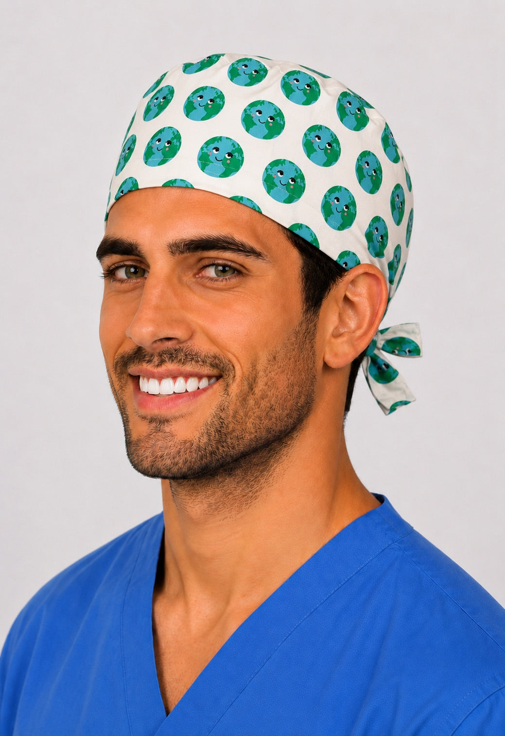 Earth globe print scrub cap side view — breathable cotton tie-back surgical hat for OR nurses and surgical techs, made in the USA