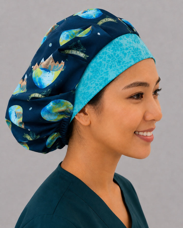 Right side profile of the earth and tree bouffant surgical hat — turquoise contrast band with navy globe print, roomy breathable cotton cap