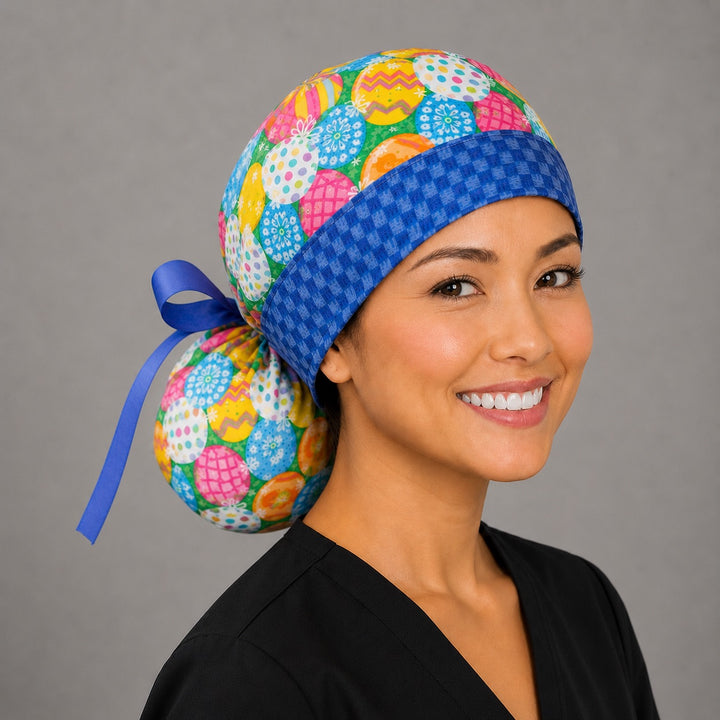 Easter colorful eggs ponytail scrub cap right side profile with full ponytail pouch of vibrant decorated eggs and long lavender ribbon ties