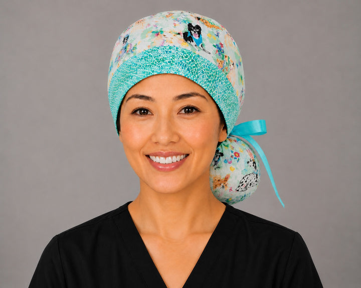 Easter dog ponytail scrub cap back view close-up showing gathered pouch full of bunny-ear puppies, Easter eggs, chicks and spring flowers with aqua ribbon bow