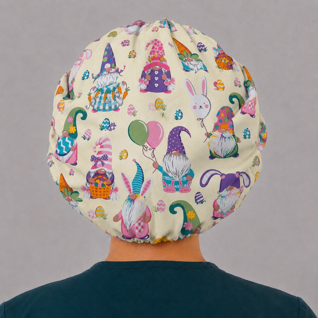 Back view of the Easter gnomes bouffant scrub cap — full roomy fit showing gnomes, bunnies, balloons and painted eggs on buttercream