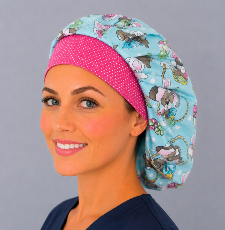 Woman wearing an Easter Hoppy Tails bouffant scrub cap, front view — cartoon puppies with bunny ears and Easter baskets on aqua with pink polka-dot band, adjustable women&
