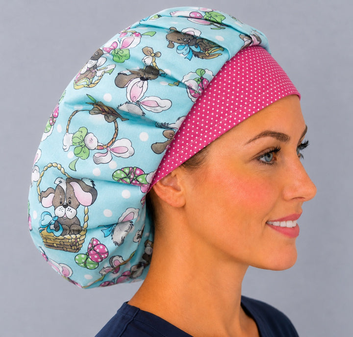 Easter puppy bouffant scrub cap angled view on a smiling vet tech — cute dog and bunny-ears print roomy cap that secures long thick hair