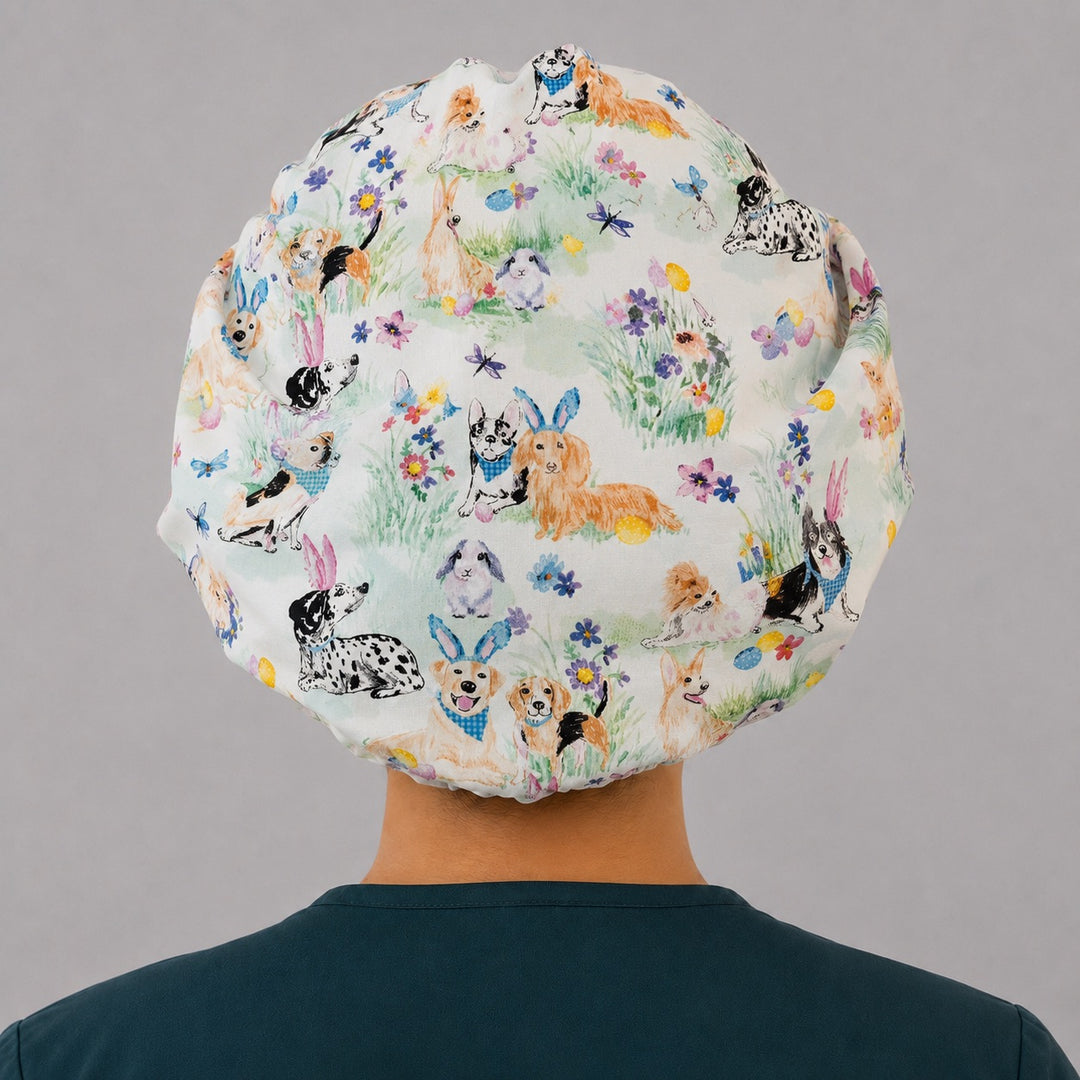 Back view of the Easter Pups and Petals bouffant scrub cap — full roomy fit showing watercolor puppies, bunnies, eggs and spring florals