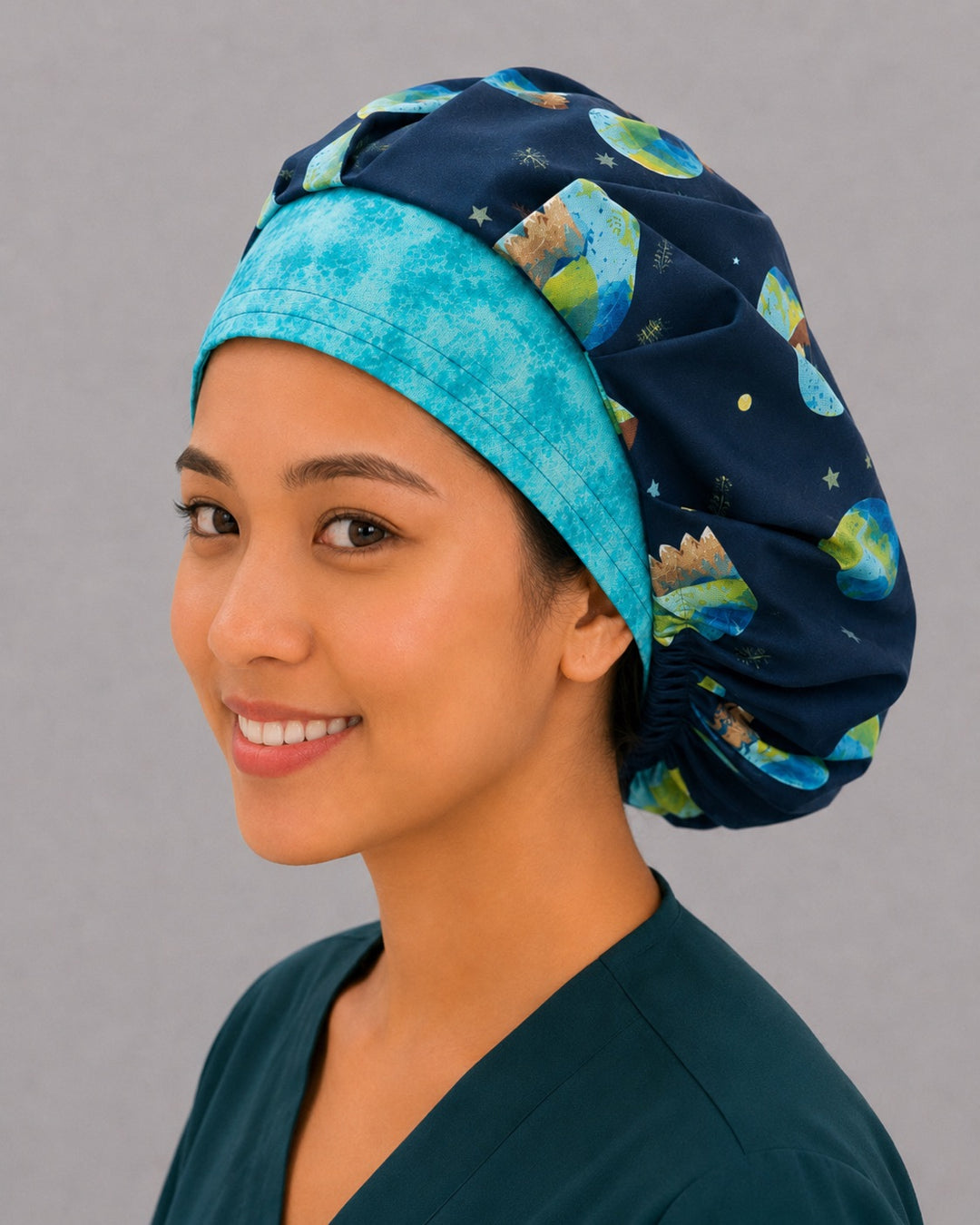 Eco earth and mountain bouffant surgical cap, side view — navy planet print bouffant hat for surgeons, CRNAs and vet techs
