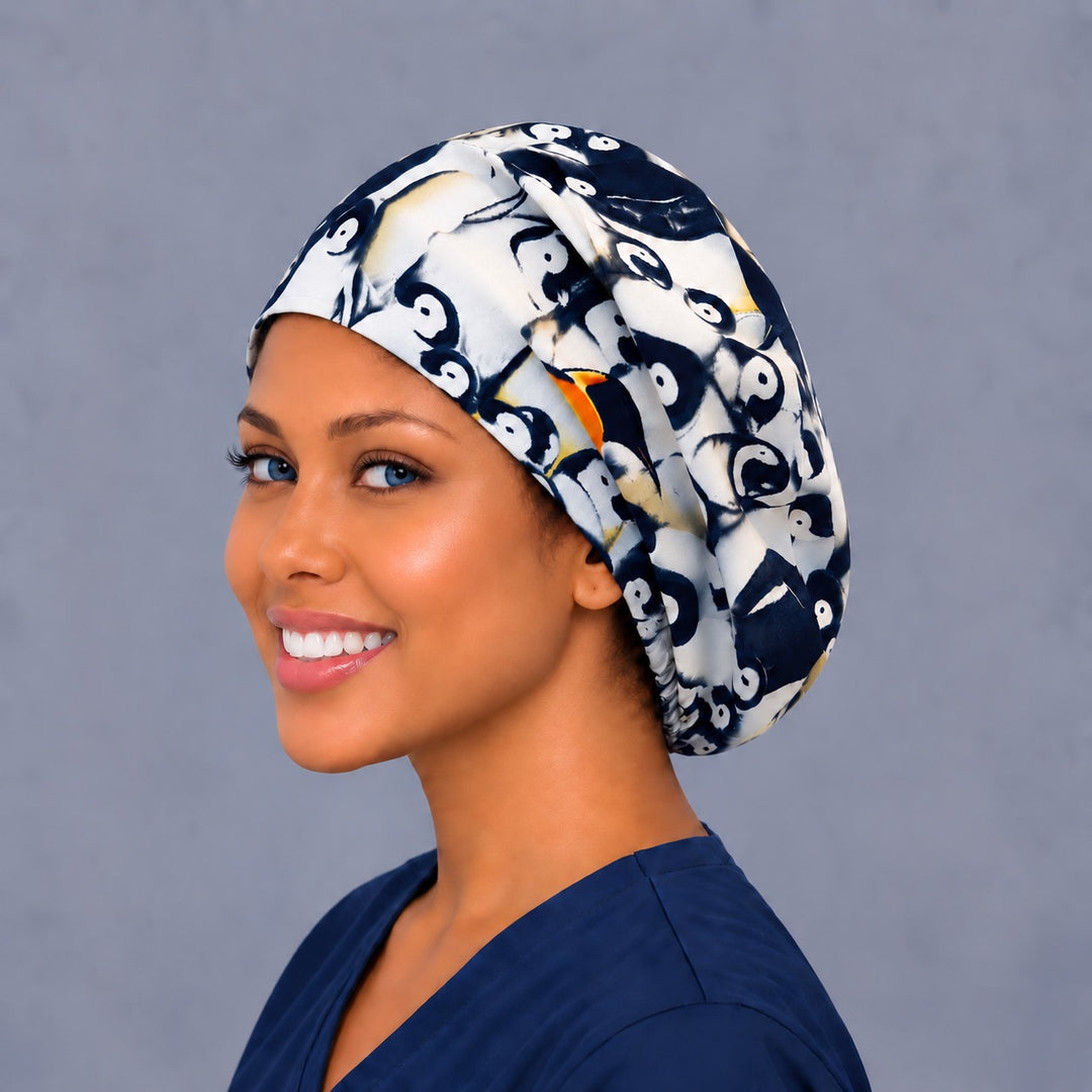 Emperor penguin Euro surgical cap, left angled view — elastic adjustable back that secures long or thick hair
