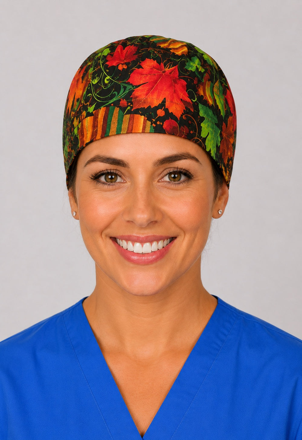 Fall leaves scrub cap for short hair, handmade black tie-back autumn surgical hat with maple foliage on OR nurse, front view