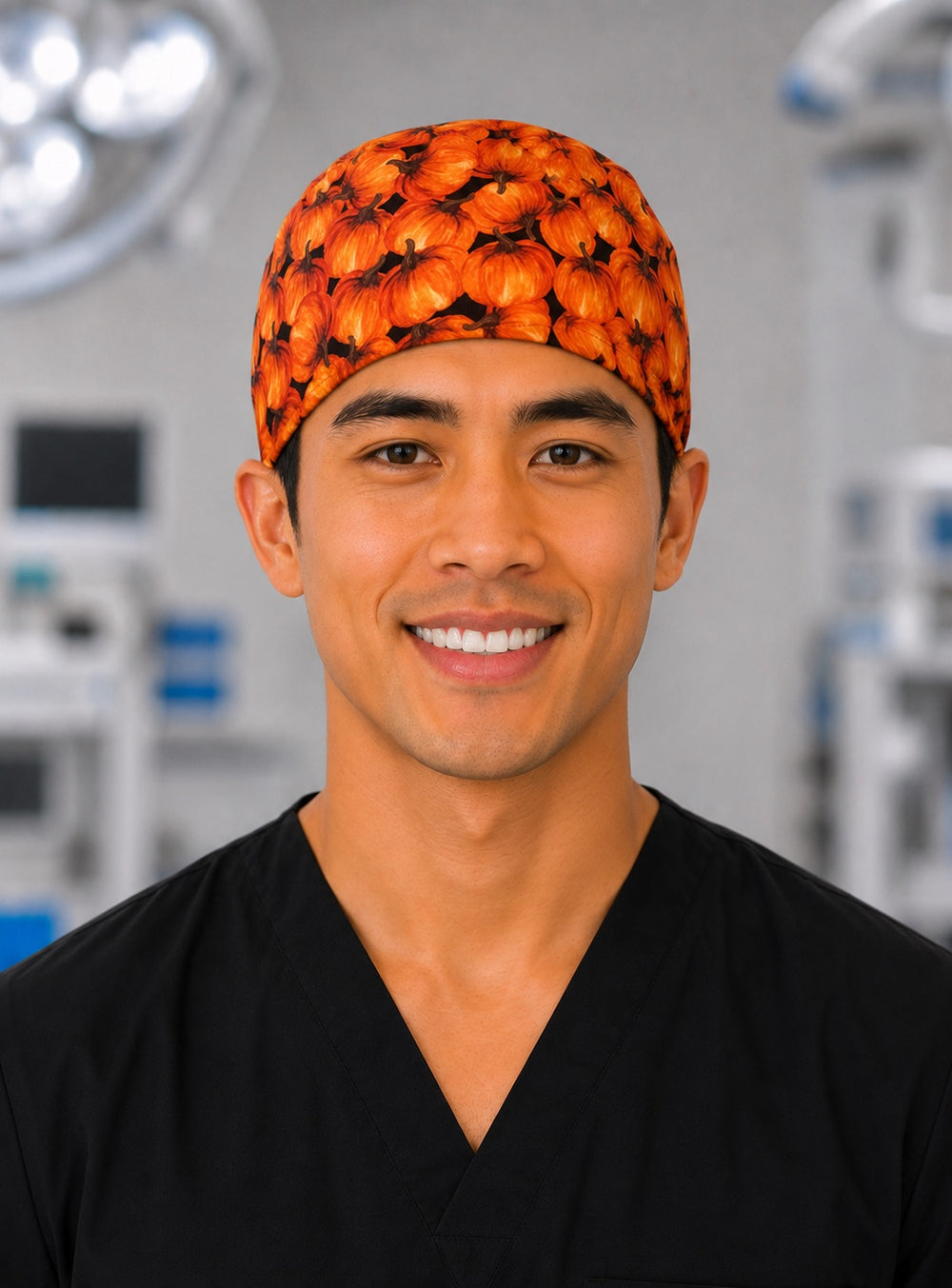 Pumpkin patch fall scrub cap with realistic orange pumpkins on black, handmade men's tie-back autumn surgical hat on male OR nurse, front view