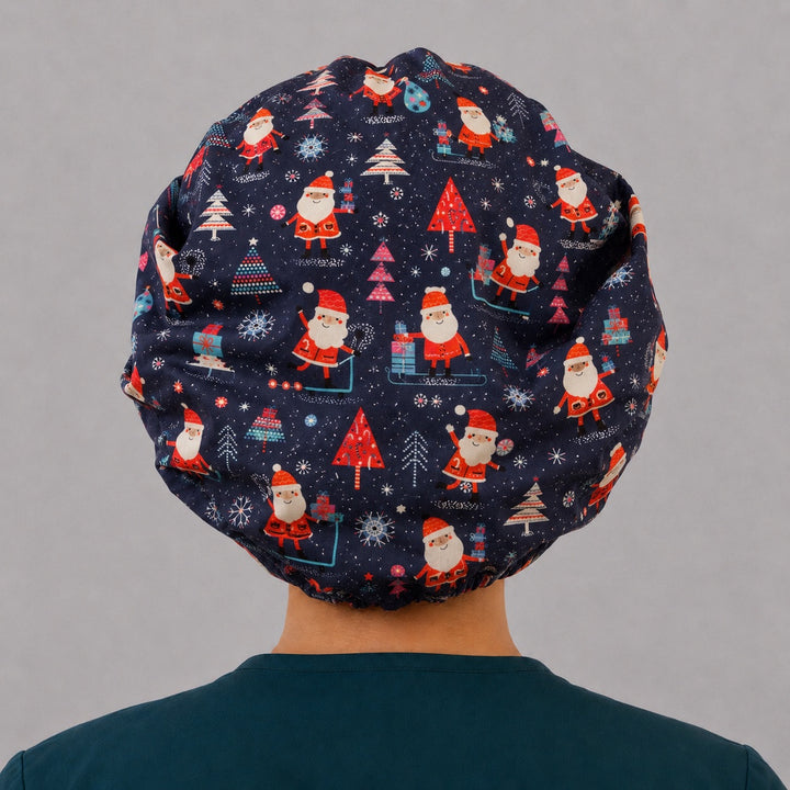 Back view of the festive Santa bouffant scrub cap — full gathered coverage showing Santas, trees and snowflakes across the navy crown