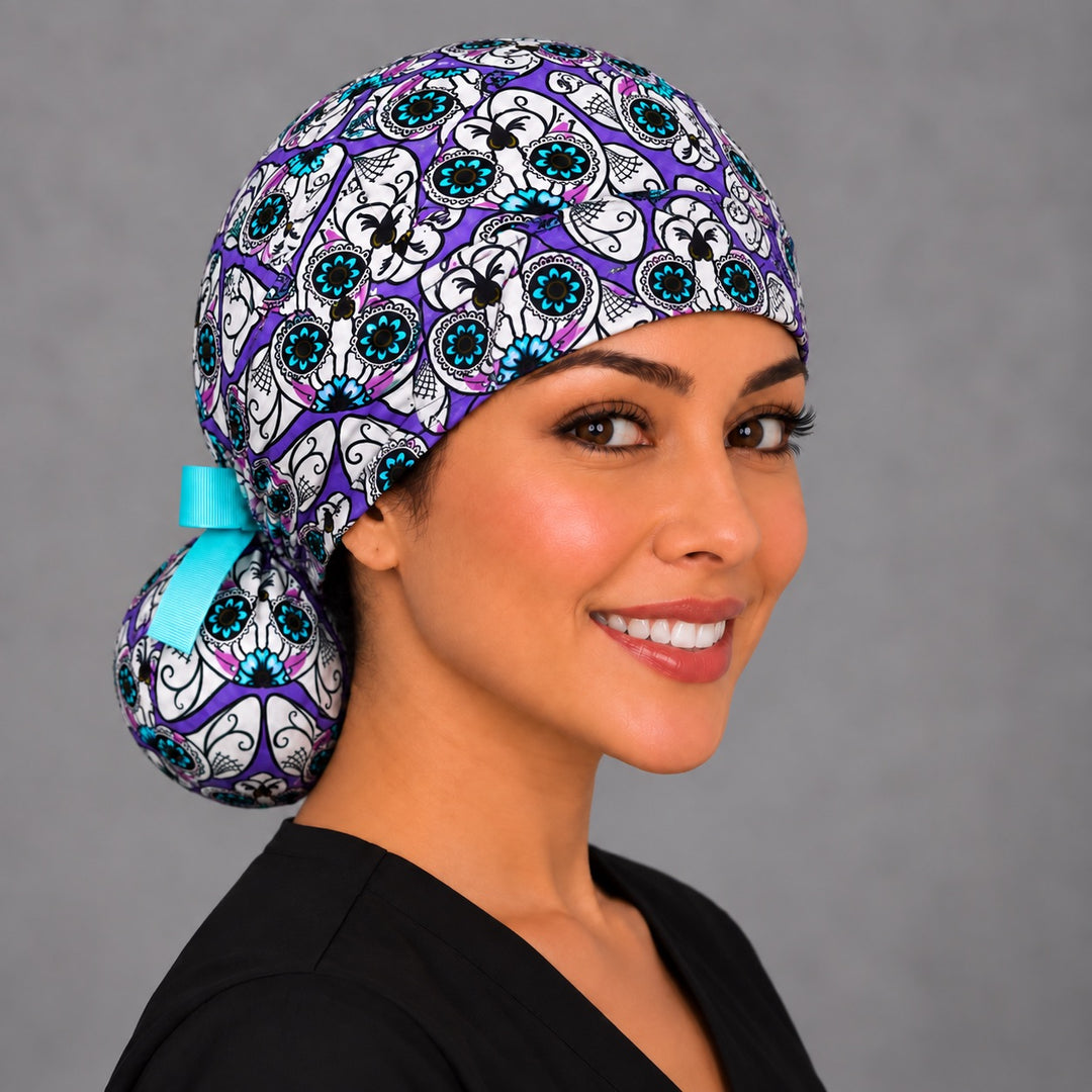 Fiesta cat ponytail surgical hat, right angled view — smooth front band and deep pouch that holds long or thick hair