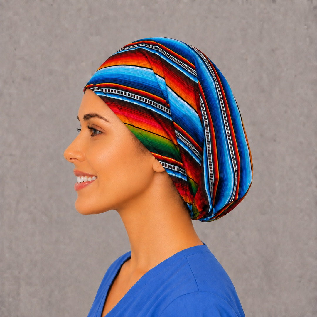 Fiesta serape Euro surgical cap, left angled view — elastic adjustable back with full head coverage for long hair
