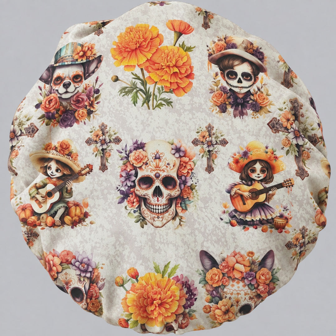 Full back view of the fiesta sugar skull bouffant scrub cap — flat lay showing marigolds, crosses and calaverita characters