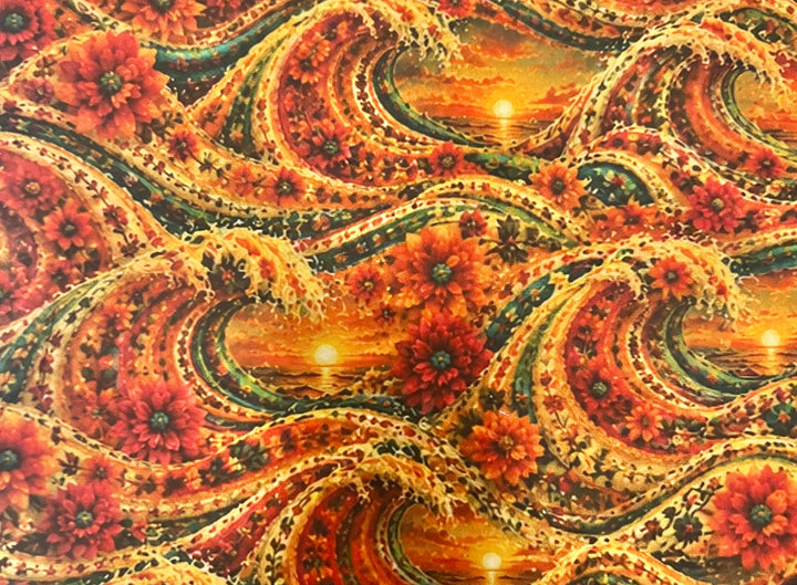 Fabric detail of the fiesta sunset scrub cap — close-up of cresting gold waves, glowing sunsets and red flowers on cotton