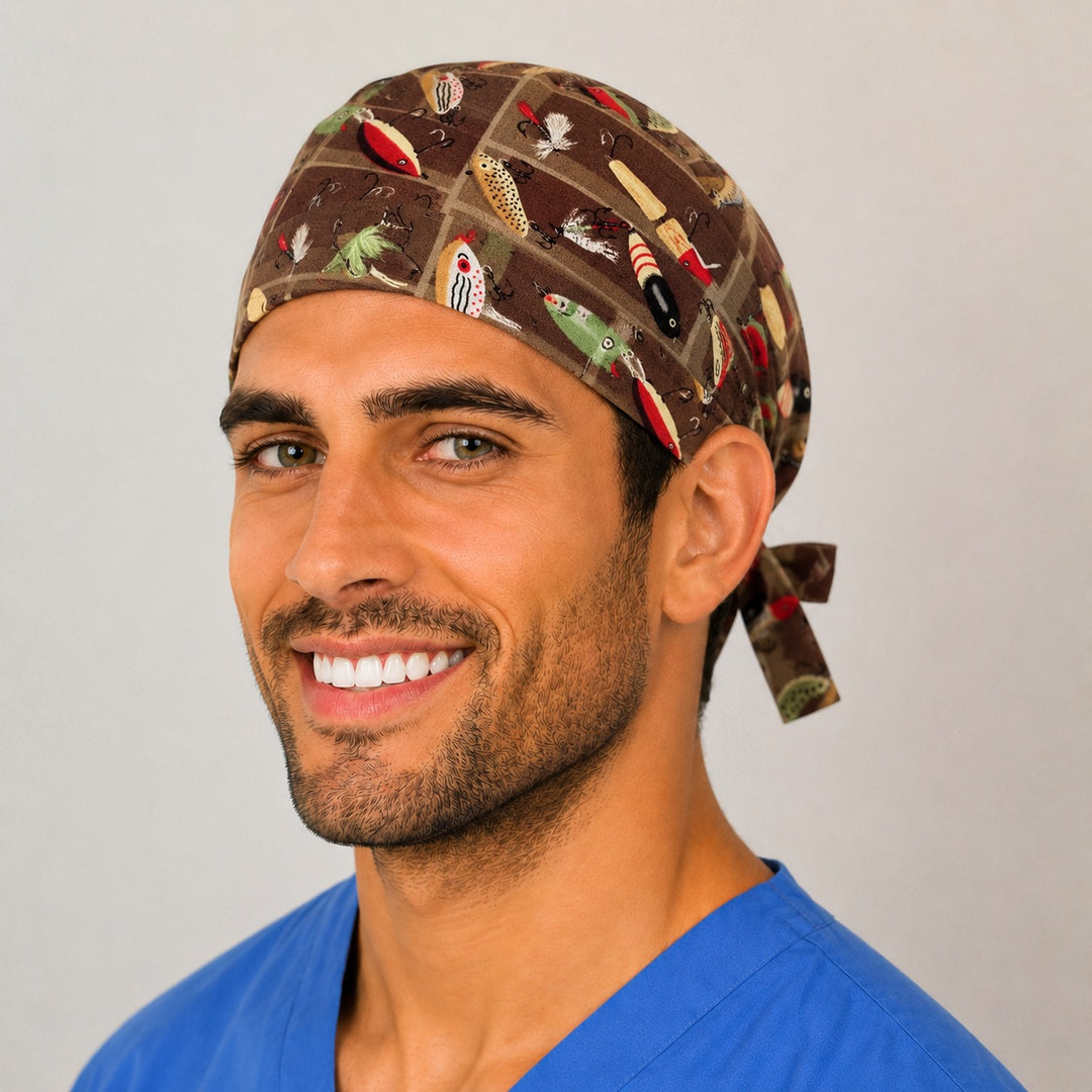Fishing lures scrub cap on a smiling male nurse, side view showing the tackle print and tie-back