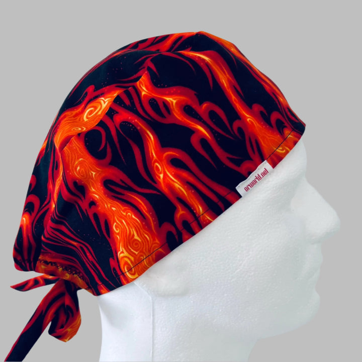 Side view of orange &amp; black flame scrub cap — handmade in the USA, adjustable tie-back surgical cap for nurses &amp; surgeons.