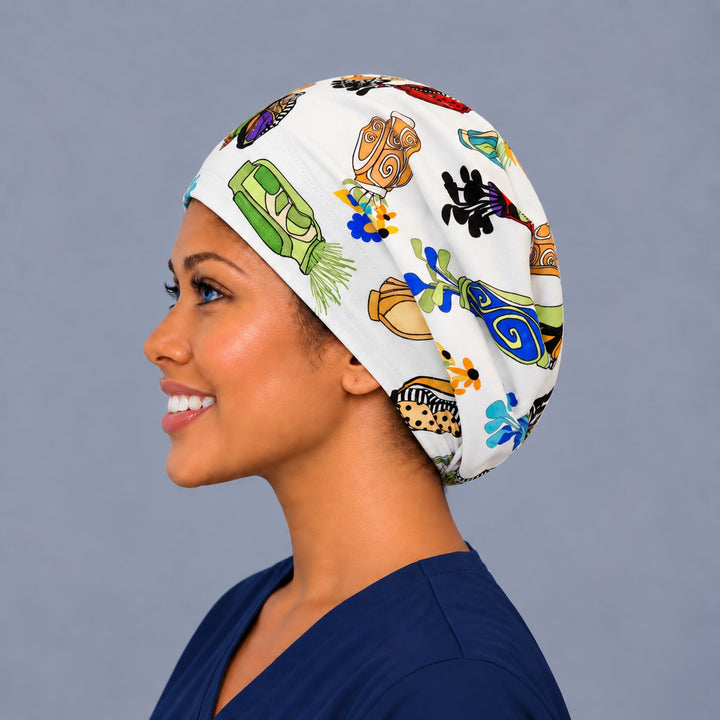 Floral golf Euro scrub cap, left side profile — daisy and wildflower bouquet print for OR nurses and surgical techs