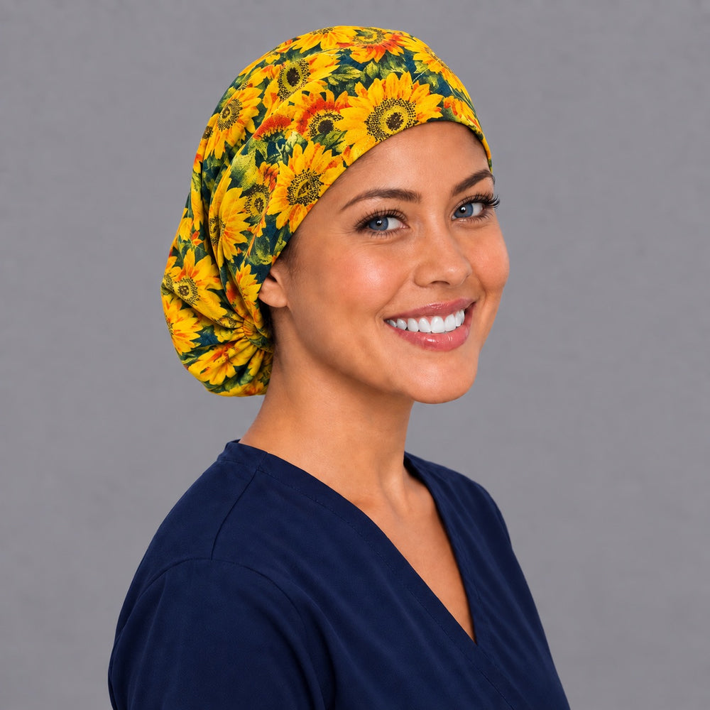 Floral sunflower Euro scrub cap, right angled smiling view — bright bloom print for OR nurses and surgical techs