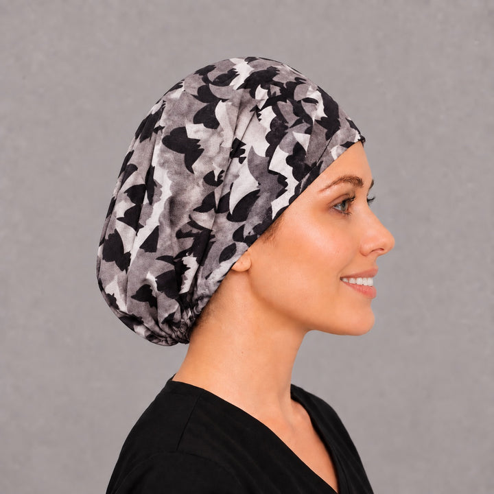 Flying bats Euro cap for women, right side profile — breathable cotton Halloween surgical cap with full coverage