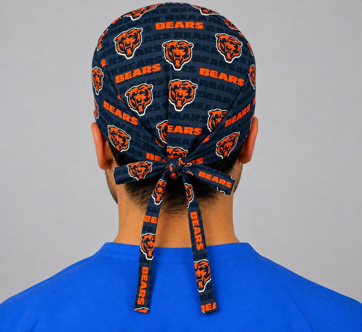 Back view of a handmade tie-back OR cap with long matching fabric ties knotted at the base of the neck for an adjustable fit without elastic