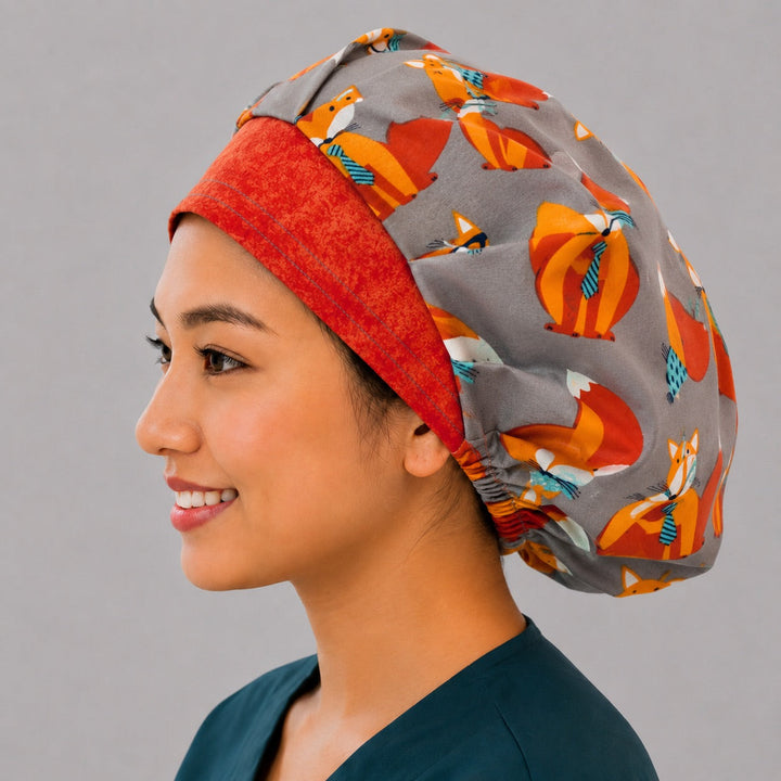 Foxy Foxes bouffant scrub cap side profile on model, showing full dome fit for long hair, women&
