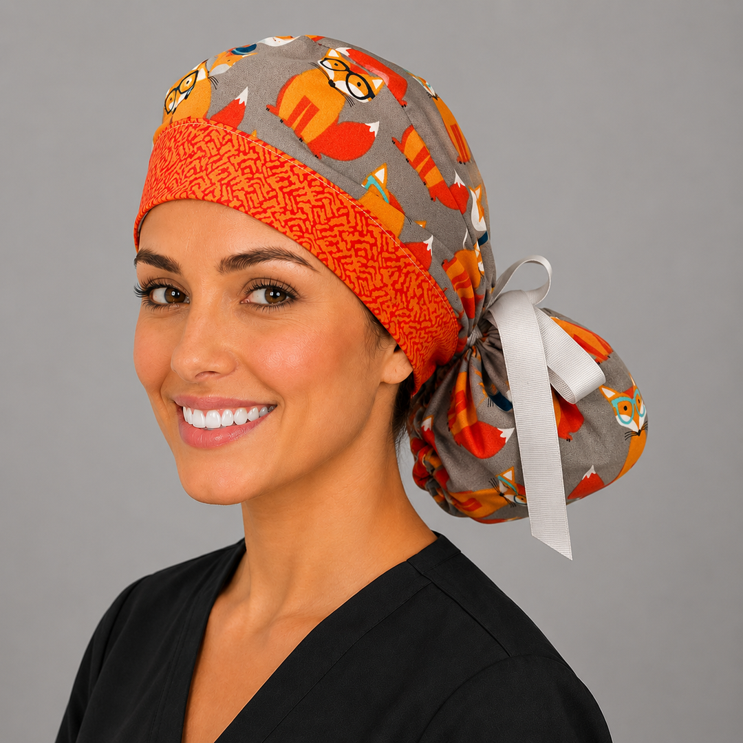 Fox print ponytail scrub cap back view showing pouch and bow for long hair, gray and orange fox surgical hat for nurses and vet techs, handmade USA, OR World
