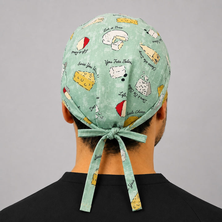 Back view of OR World funny cheese tieback scrub cap for men, adjustable bow tie, nurse surgical hat