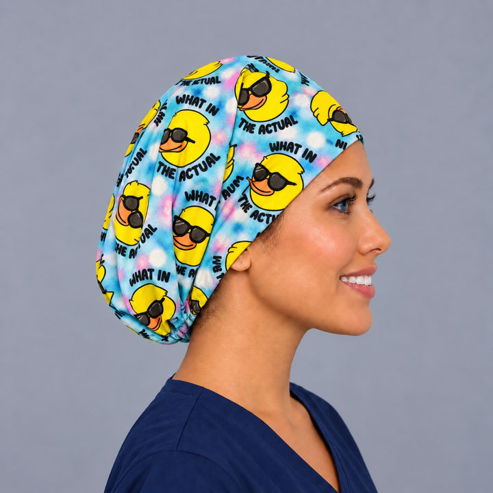 Right side profile of the funny duck sunglasses Euro surgical hat — pastel tie-dye rubber duck print, breathable cotton cap