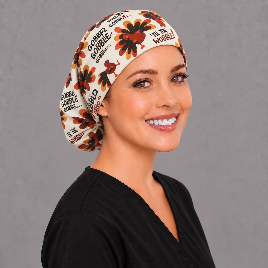 Funny turkey Euro scrub cap, left side profile — red and gold feather print for OR nurses and surgical techs