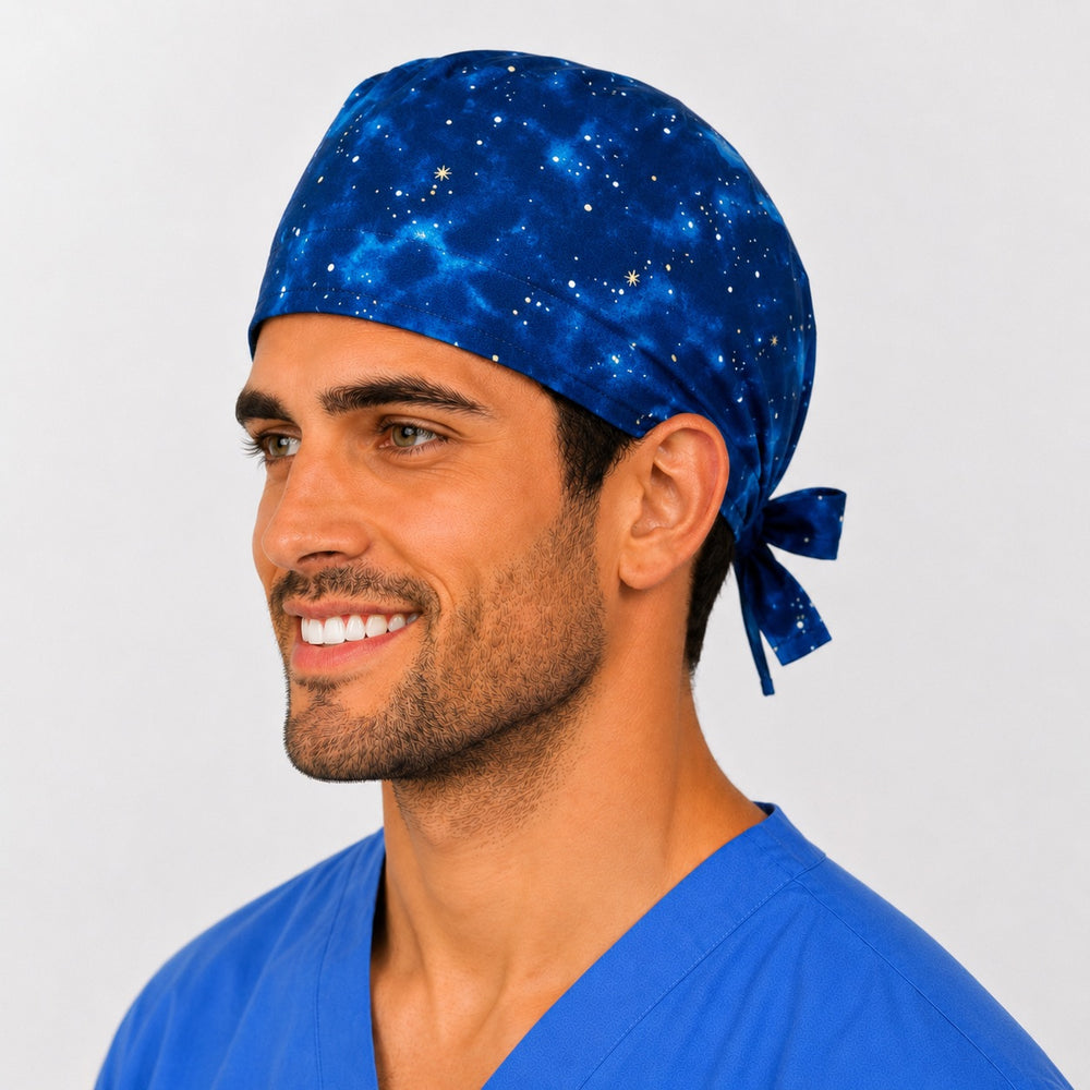 Blue galaxy space scrub cap side view — deep blue starry sky tie-back surgical cap, handmade in the USA, gift for space-loving nurses