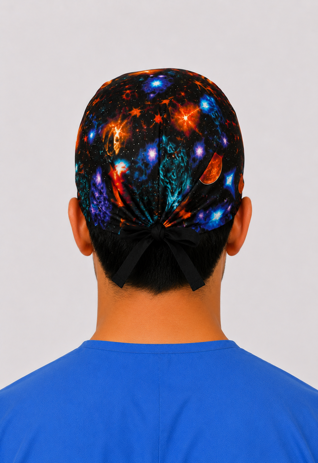 Back view of galaxy planets tie-back scrub cap showing bow tie closure — handmade-in-USA OR World men&
