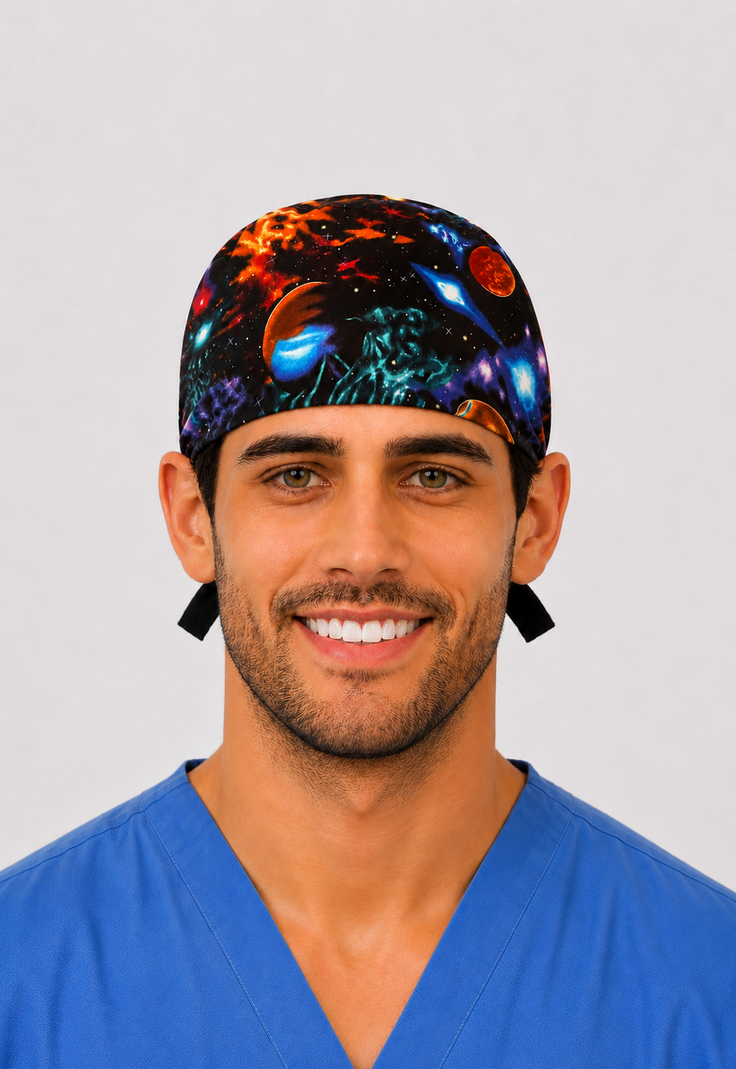Man wearing galaxy planets tie-back scrub cap with nebulas & planets, front view — handmade-in-USA men's surgical hat from OR World.