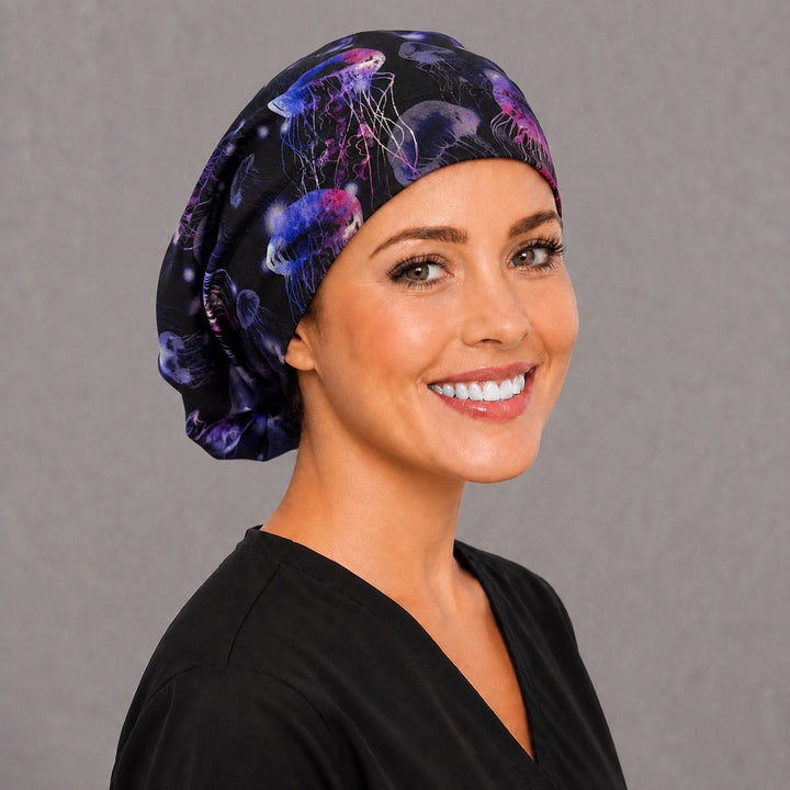Glowing jellyfish Euro scrub cap, right angled smiling view — luminous ocean print for surgical techs and night-shift teams