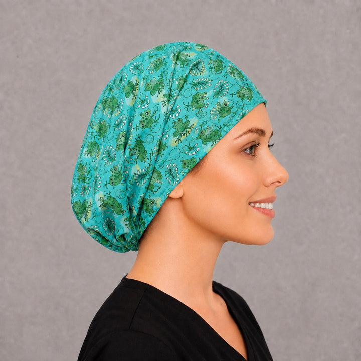 Right side profile of the green frog Euro surgical hat — dragonfly and fern print, breathable cotton cap for nurses