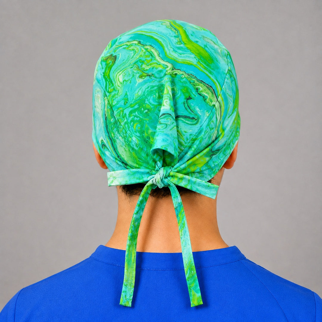 Back view of adjustable tie-back knot on teal green marble unisex surgical hat