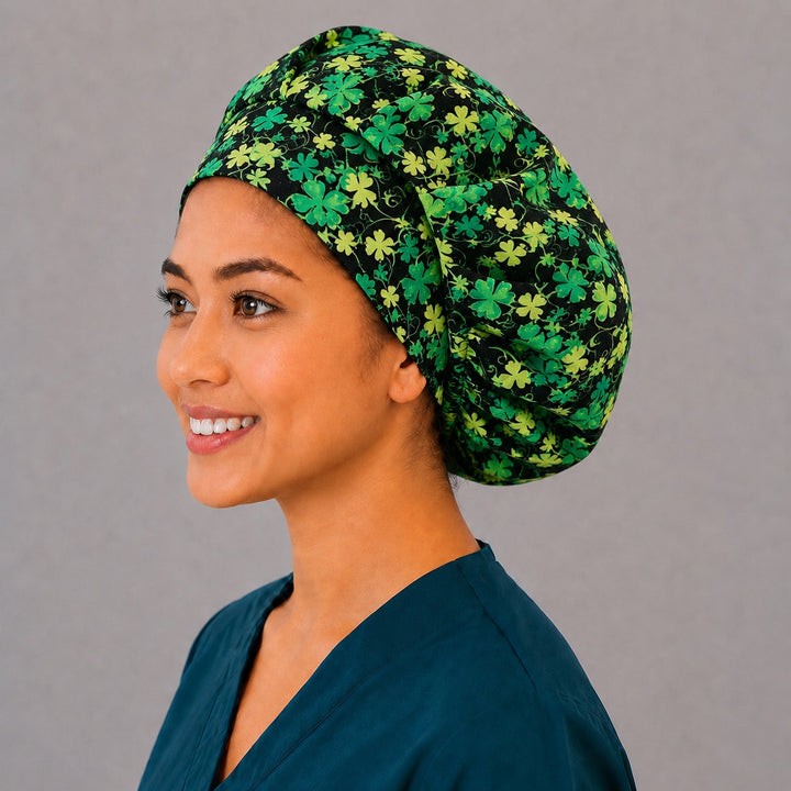 Green shamrock bouffant scrub cap, left side profile — four-leaf clover print for OR nurses and surgical techs