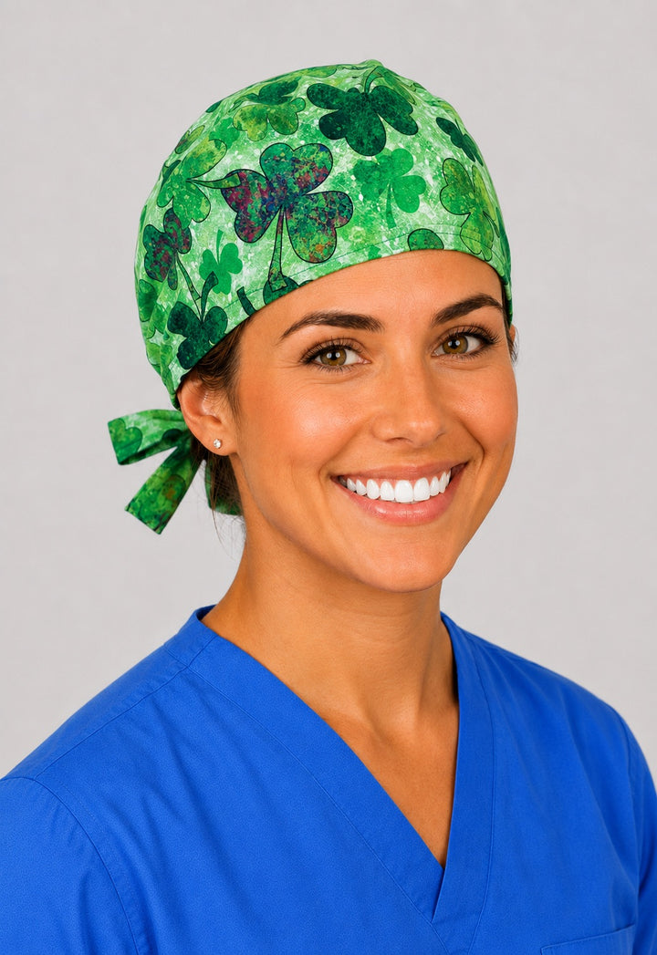 Left profile of green shamrock scrub cap for women with short hair, Irish four-leaf clover OR cap