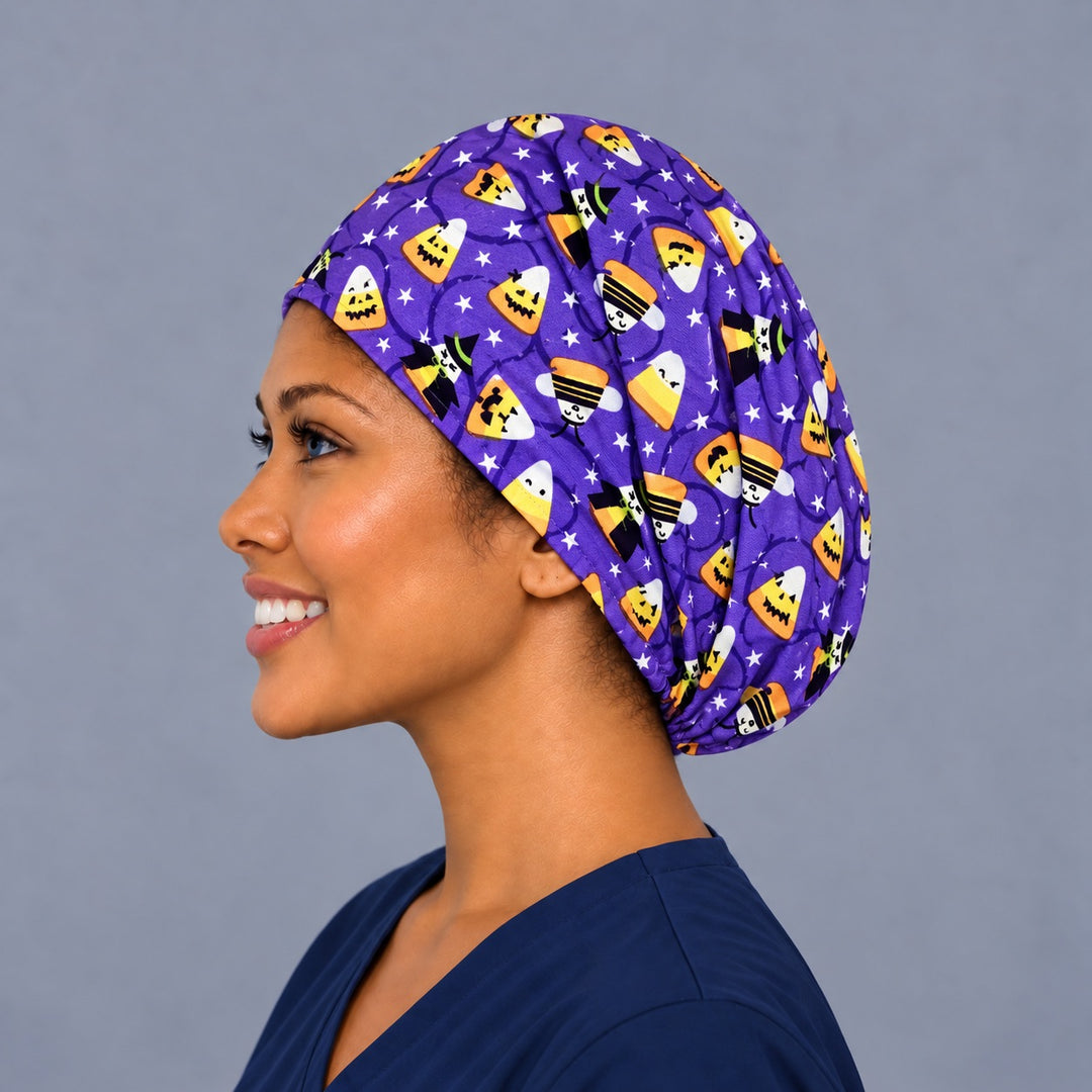 Right side profile of the Halloween candy corn Euro surgical hat — witch hat and star print, breathable purple cotton cap for nurses