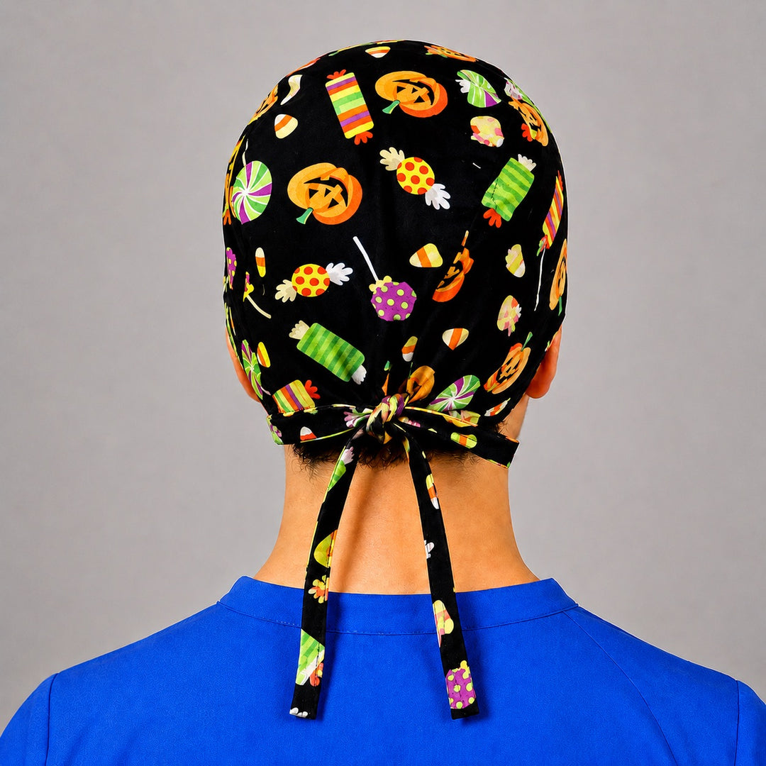 Back view of adjustable tie-back knot on black Halloween candy corn unisex surgical hat