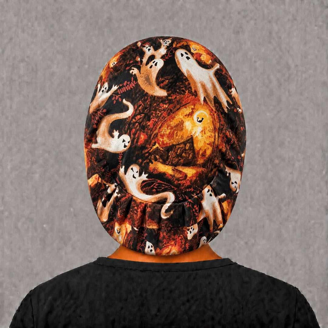 Back view of the Halloween ghost Euro scrub cap — elastic gathered back showing ghosts and harvest moons across the crown