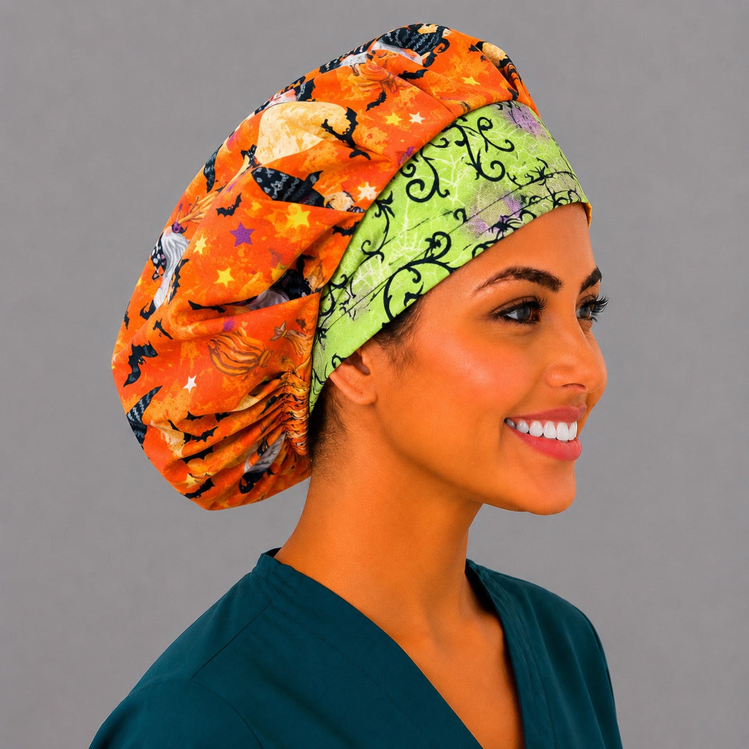 Back view of the Halloween gnome bouffant scrub cap — witch gnomes on broomsticks, harvest moons, bats and stars across the full orange crown
