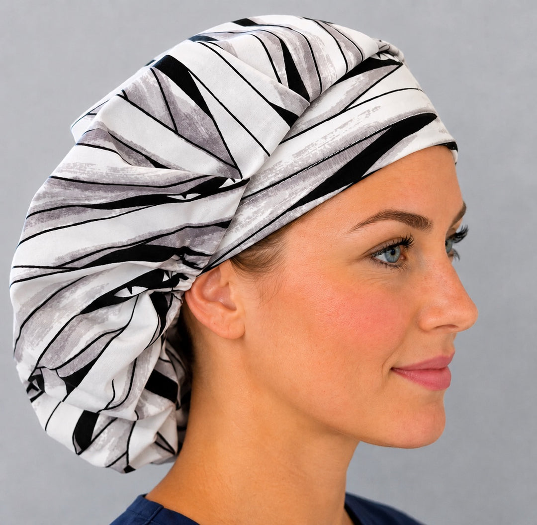 Halloween mummy bouffant surgical cap right side profile showing white and gray mummy bandage wrap with peeking eyes, OR World nurse hat