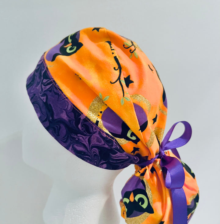 Halloween Owl Ponytail Scrub Cap | Orange &amp; Purple Fall Nurse Cap | Witch Owl Surgical Hat | Adjustable Nurse Gift | left side view