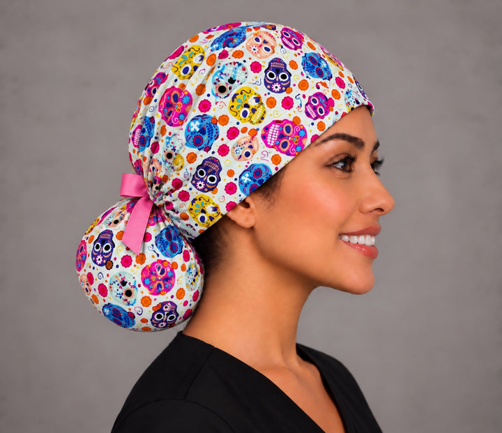 Opposite side profile of a Halloween ponytail OR cap in 100% cotton, showing the smooth forehead band and a full round bun pouch holding long hair