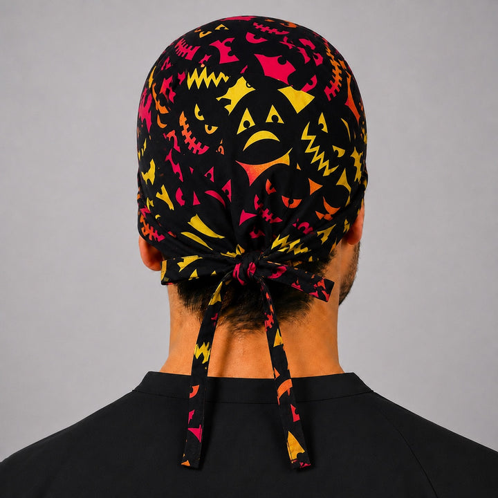 Back view of adjustable tie-back knot on neon Halloween pumpkin faces jack-o&