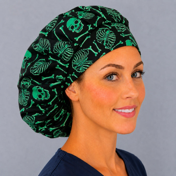 Halloween skull bouffant scrub cap for long hair, left angled view — deep gathered fit that secures thick or braided hair