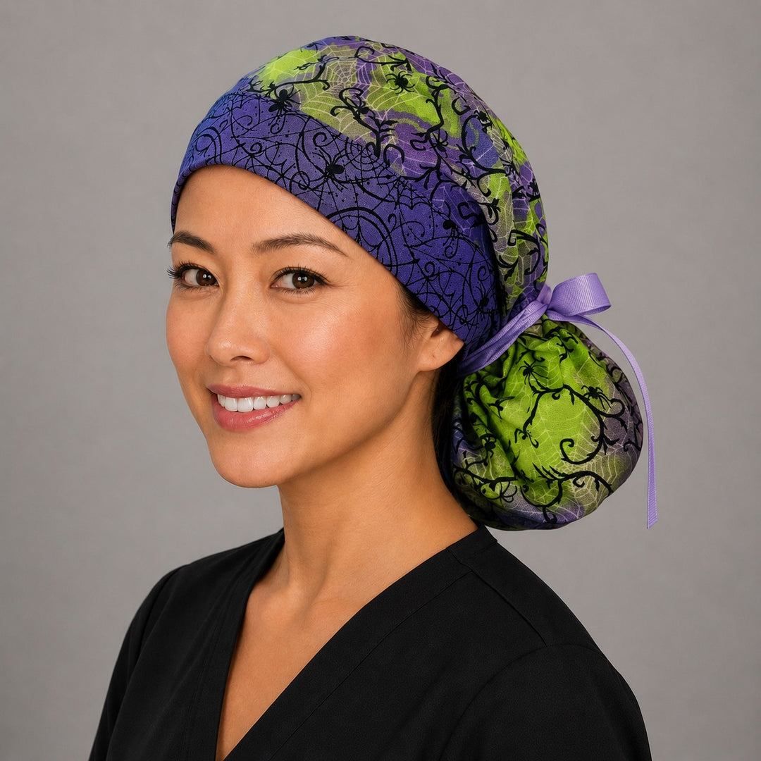 Halloween spider ponytail scrub cap right side profile showing gathered pouch of black spiders and webs on purple and lime green with purple ribbon tie